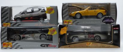 Four Maisto 1:18 scale diecast model cars comprising Mercedes-Benz SLK 230 31838, GT Racing Mercedes