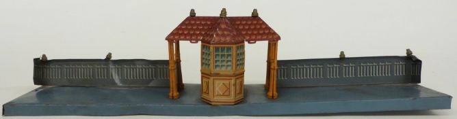 Bing 0 gauge tinplate train station stamped Germany and with maker's mark to the base, 40cm long.