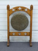 Victorian oak Gothic Revival dinner gong with pierced decoration, W58 x D30 x H95cm