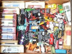 Ninety-four Corgi, Dinky, Matchbox and similar diecast model vehicles, some in original boxes.