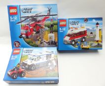Three Lego building sets City Fire Helicopter 60010 (2013), City Prisoner Transporter 60043 (2014)