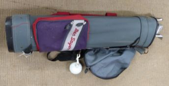 A set of golf clubs including John Letters irons in a golf bag.