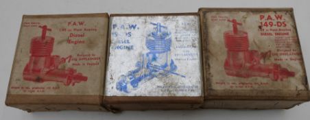 Three boxed PAW vintage diesel compression ignition model aircraft engines, one 3.2cc the other