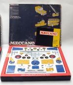 Two Meccano construction sets Outfit 5 and Outfit 8, both in original boxes.