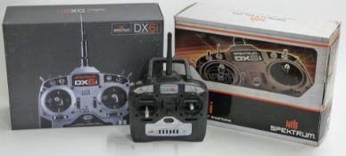 Spektrum DX6i 2.4ghz radio control transmitter in original box together with Spektrum DX4e