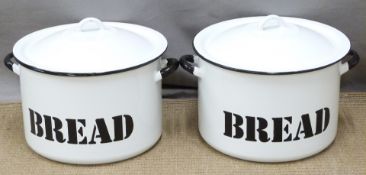 A pair of twin handled lidded enamel bread bins, diameter 32 x H26cm