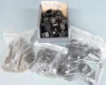 A large collection of scope mounts of various sizes.