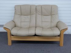 Ekornes leather two seat reclining sofa, W174 x D86 x H96cm