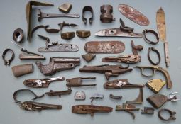 A collection of gun parts and lock plates some named and engraved including R. Pritchard, and