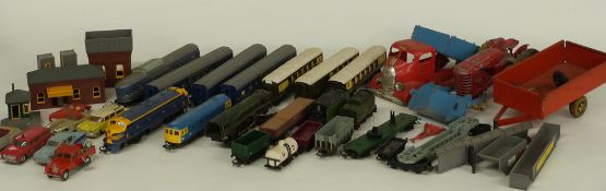 A collection of diecast and tinplate model vehicles, model railway accessories etc including