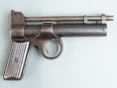 Webley Junior .177 air pistol with reeded metal grips, serial number J21878.