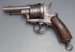 11mm six-shot double action pinfire revolver with engraved frame and cylinder, chequered grips, belt