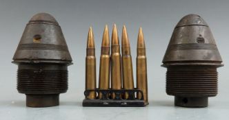 Two WWI ordnance fuses together with a clip of five practice .303 rounds