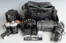 Olympus OM10 SLR camera body with auto winder, Sony CCD-TRV15E video camera and a Zenit-E with