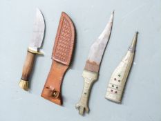 Browning 4518 hunting knife with 11cm blade, in leather sheath and a Middle Eastern tribal knife and