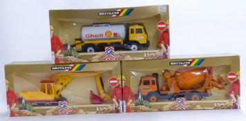 Three Britains model construction vehicles 9910, 9911 and 9913, all in original display boxes.