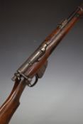 Deactivated Long Lee Enfield bolt-action rifle with bolt shield, mag lever, brass butt plate with
