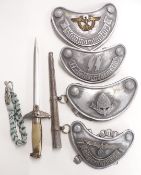 Four Nazi German style gorgettes and a similar dagger
