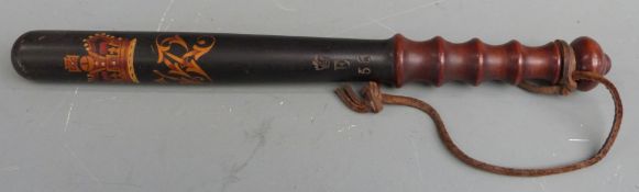 Painted Victorian truncheon with Royal cipher and E55 stamped under crown, with leather wrist strap,