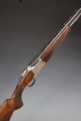Winchester 5000 Field 12 bore over and under shotgun with engraved locks and trigger guard, single