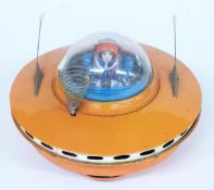 KO Toys Yoshiya Japan tinplate battery operated Space Patrol Bump 'n' Go model spaceship with orange