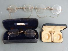 Two pairs of frameless rolled gold vintage spectacles together with a further pair of spectacles