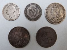 A small collection of George III and Victorian silver to include three crowns and two half crowns