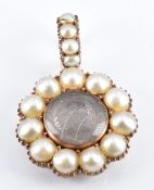 Victorian rose gold locket set with split pearls with a central glass compartment, diameter 2cm