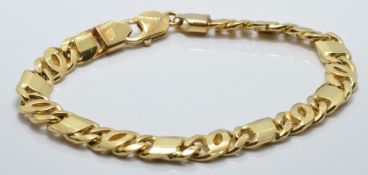 An 18ct gold curb link bracelet, 42g
