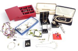 A collection of costume jewellery including beads, pearl necklace, silver bracelet set with