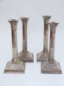 Set of four Mappin & Webb Prince's Plate silver plated Corinthian column candlesticks, height 28.5cm