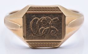 A 9ct gold signet ring with engine turned and initial decoration, 5.5g, size T