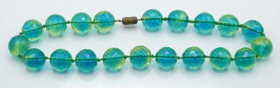 A late 19th/ early 20thC necklace made up of greenish blue faceted beads
