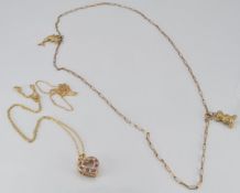 Three 9ct gold chains/ necklaces and three 9ct gold pendants set with diamonds and rubies, 6.5g
