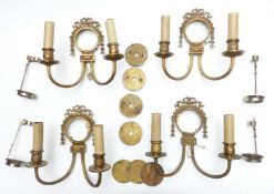 Four early/mid 20thC wall lights with neoclassical decoration, height 25cm