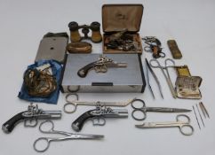 A quantity of small collectables including miniature pistols and revolvers, opera glasses, Joseph