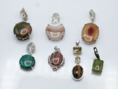 Seven silver pendants set with vesuvianite & zircon, agate, chrysocolla & diamond, agate & white