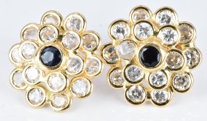 A pair of 18ct gold earrings set with a sapphire and cubic zirconia, 4.8g
