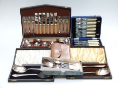 Quantity of cased silver plated cutlery to include serving spoons, fish eaters, six place setting