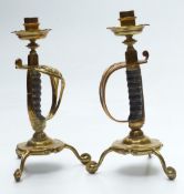 Pair of shagreen-handled sword handle novelty candlesticks, height 31cm