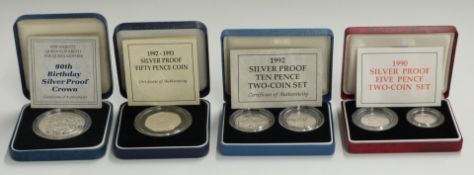 Four Royal Mint cased silver proof coin sets comprising 1990 old design / new design 5p, 1992 old