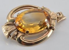 A 9ct gold pendant set with a citrine, 6.8g