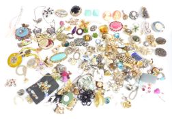 A collection of brooches and earrings including enamel and marcasite, Monet, Miracle, white metal,