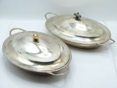 George III near pair of hallmarked silver covered oval serving dishes with ribbed rims and looped