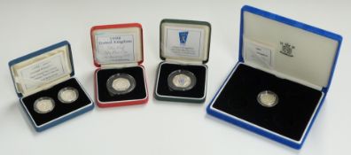 Royal Mint 1999-2000 UK Silver Proof £1 Millennium Two-Coin Set and two 50p EEC and NHS, all cased