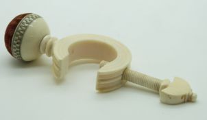 A 19thC Indian Madras ware ivory sewing / needlework pin cushion clamp, height 12cm