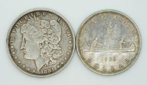 1881 Morgan USA one dollar together with a 1936 George V Canada dollar
