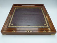 A 19thC brass-bound mahogany writing slope with secret panel revealing three small drawers, W50 x