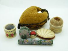 A collection of late 19th/20thC sewing / needlework items including ivory pin cushions, French