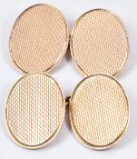 A pair of 9ct rose gold cufflinks with engine turned decoration, 8.7g